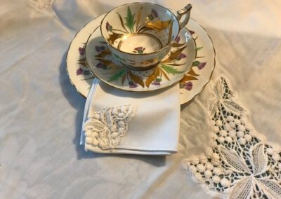 Tea cup and saucer with linen